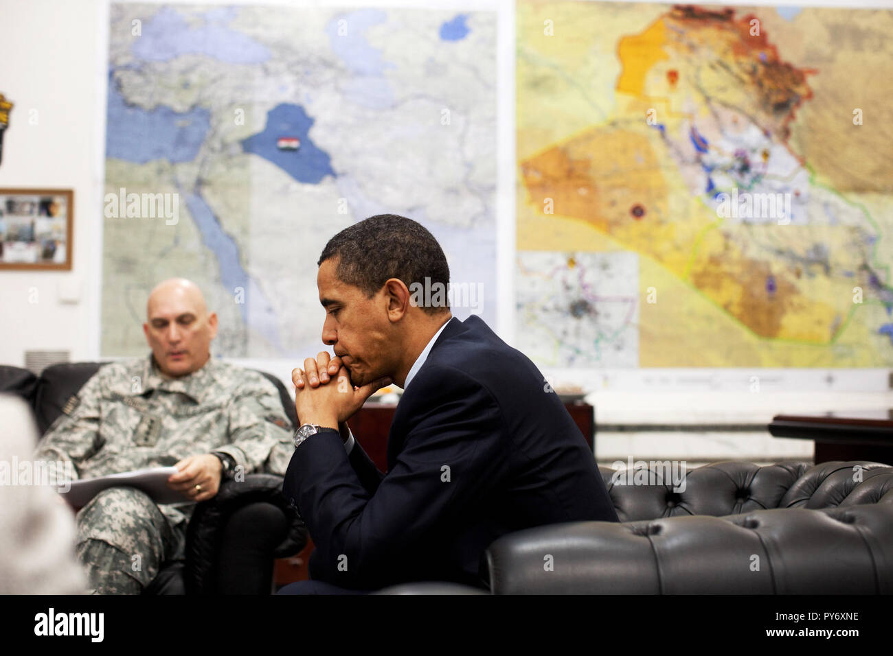 President Barack Obama meets with General Raymond T. Odierno, Commanding General, Multi-National Force-Iraq, during  the President's visit with U.S. troops at Camp Victory, Baghdad, Iraq 4/7/09.  Official White House Photo by Pete Souza Stock Photo