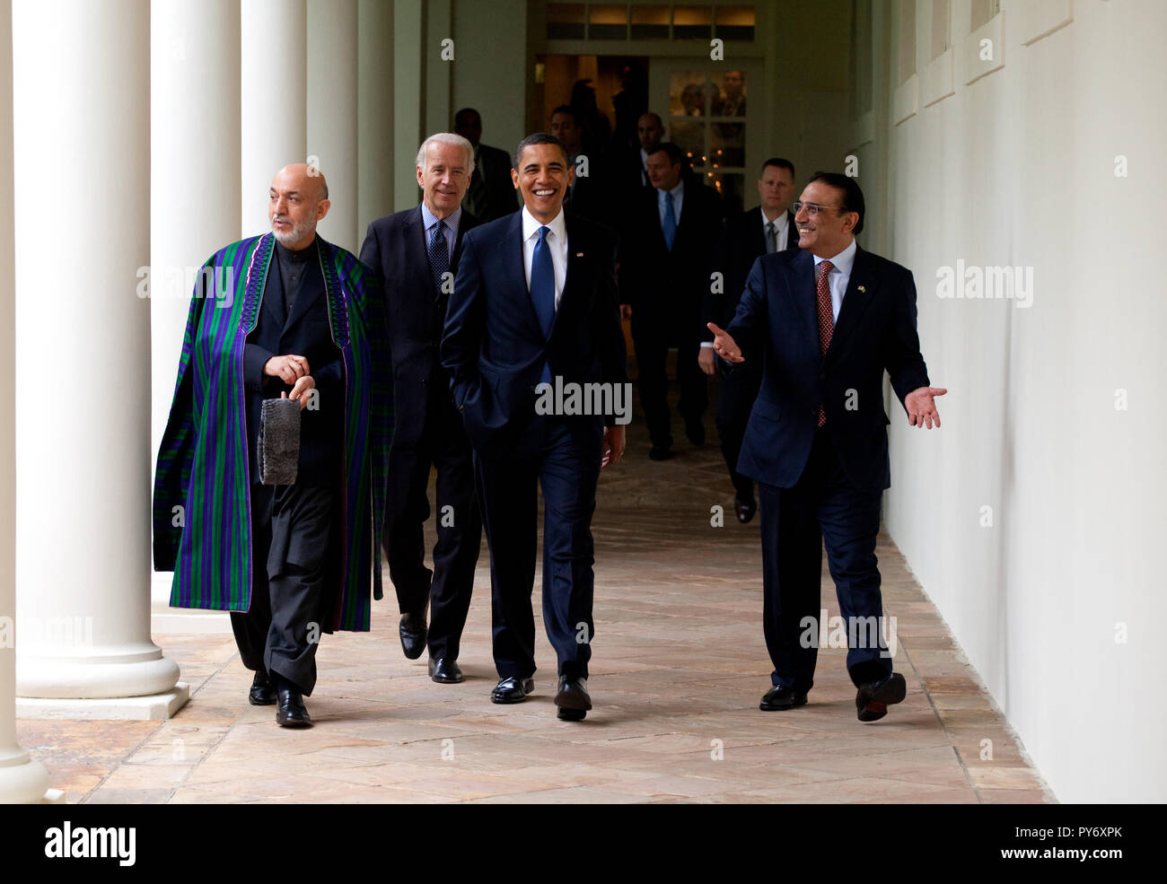 President Barack Obama (center) with Afghan President Karzai and Pakistan President Zardari walk along the Colonnade following a US-Afghan-PakistanTrilateral meeting in Cabinet Room  May 6, 2009. Official White House Photo by Pete Souza Stock Photo