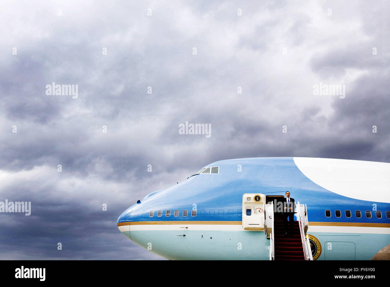 President Barack Obama leaves Air Force One at Andrews Air Force Base after a trip to New Mexico, May 14, 2009. (Official White House Photo by Pete Souza)  This official White House photograph is being made available for publication by news organizations and/or for personal use printing by the subject(s) of the photograph. The photograph may not be manipulated in any way or used in materials, advertisements, products, or promotions that in any way suggest approval or endorsement of the President, the First Family, or the White House. Stock Photo