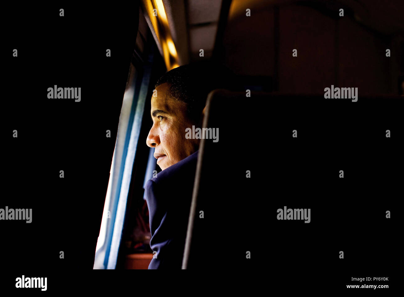 President Barack Obama looks out the window of Marine One as he leaves the U.S. Naval Academy commencement ceremony in Annapolis, Maryland, May 22, 2009.   (Official White House photo by Pete Souza)  This official White House photograph is being made available for publication by news organizations and/or for personal use printing by the subject(s) of the photograph. The photograph may not be manipulated in any way or used in materials, advertisements, products, or promotions that in any way suggest approval or endorsement of the President, the First Family, or the White House. Stock Photo