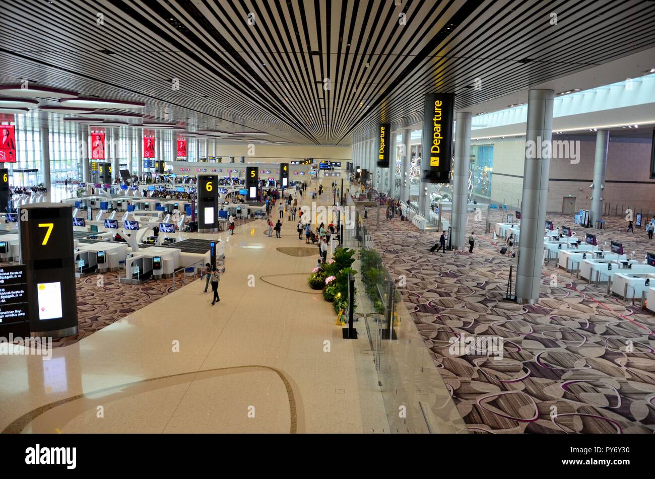 Overhead view of departure and restricted immigration area at Singapore ...