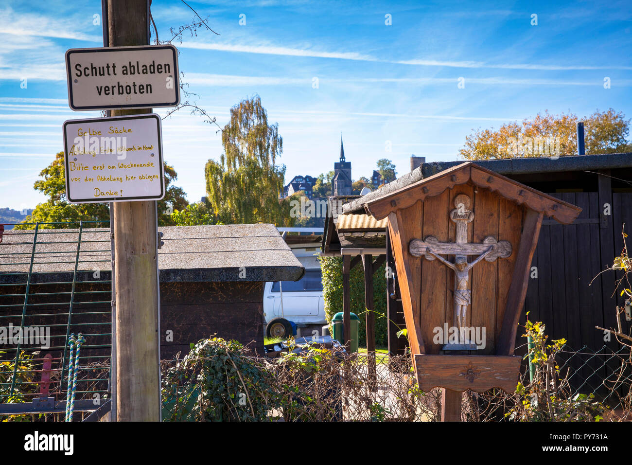 information signs and wayside cross on a campground on lake Harkort in Hagen-Vorhalle, Hagen, Germany.  Hinweisschilder und Wegkreuz auf einem Camping Stock Photo