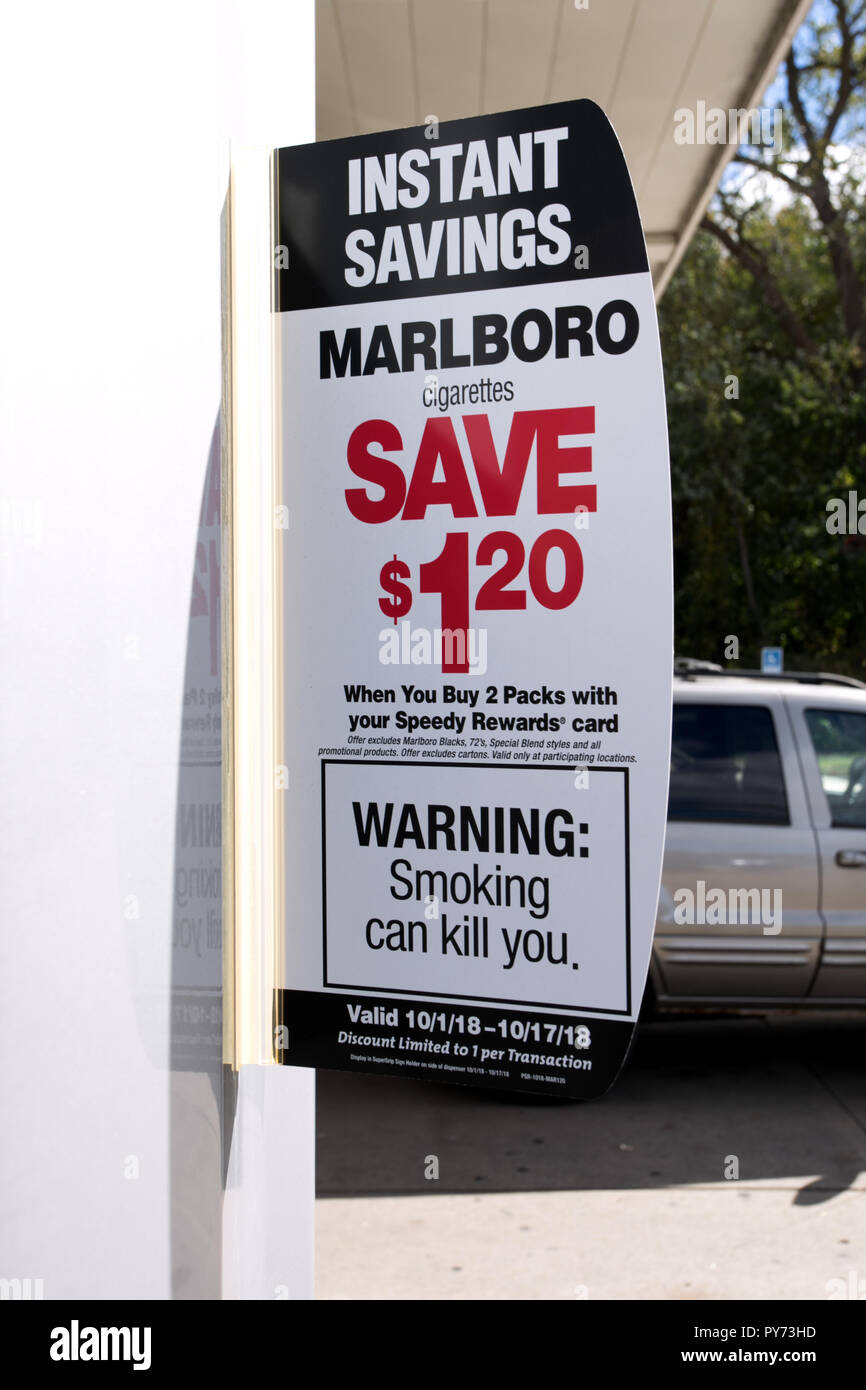 Cigarette warning sign at gas pump...Smoking can kill you Stock Photo