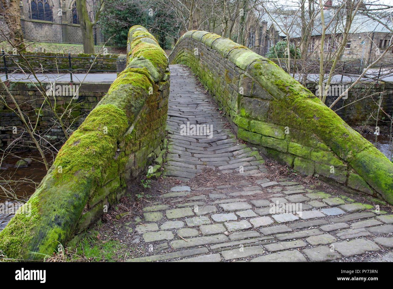 Mellor Bridge, an old packhorse bridge over the River Colne in Marsden, West Yorkshire Stock Photo