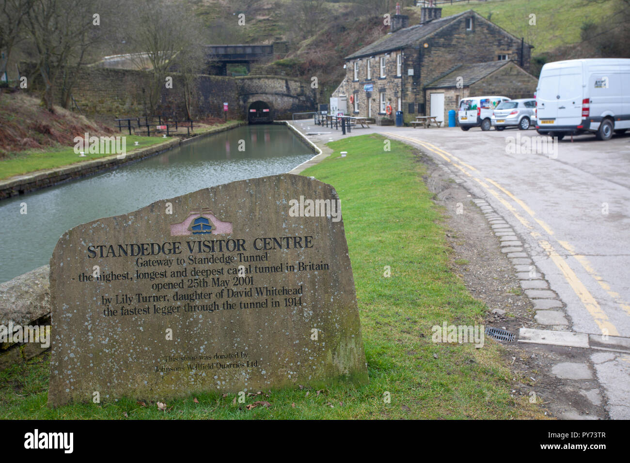 Sign and approach to the entrance to Stanedge tunnel near Marsden in West Yorkshire Stock Photo