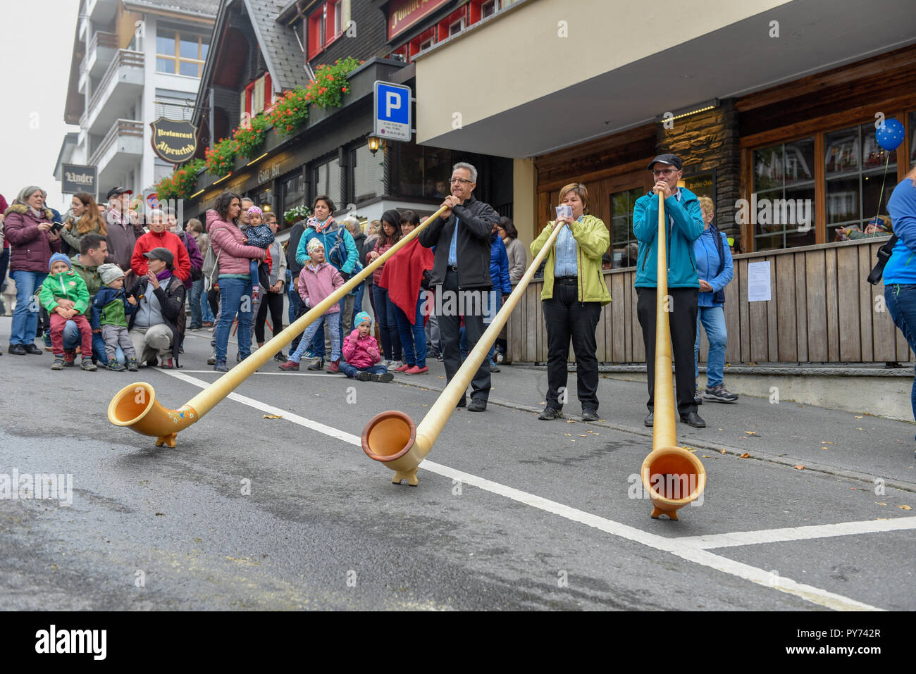 Engelberg, Switzerland - 29 September 2018: Music with alphorn at the annual transhumance at Engelberg on the Swiss alps Stock Photo