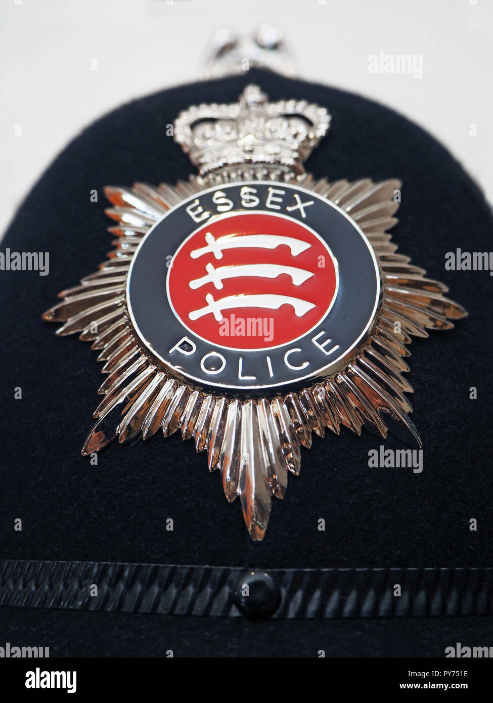 Essex police helmet and badge Stock Photo