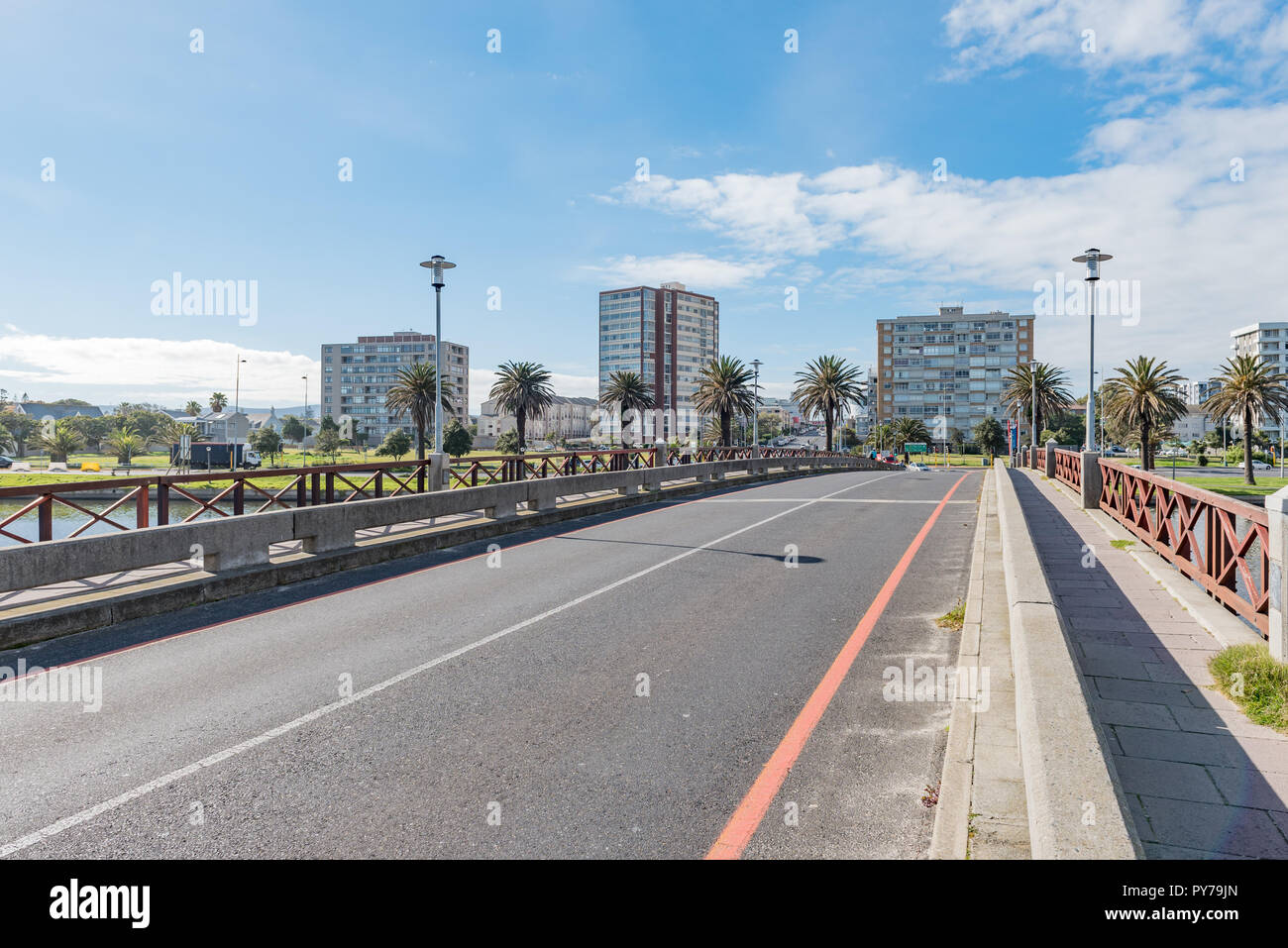 CAPE TOWN, SOUTH AFRICA, AUGUST 14, 2018: Bridge over the Diep River in Milnerton. Apartment buildings are visible Stock Photo