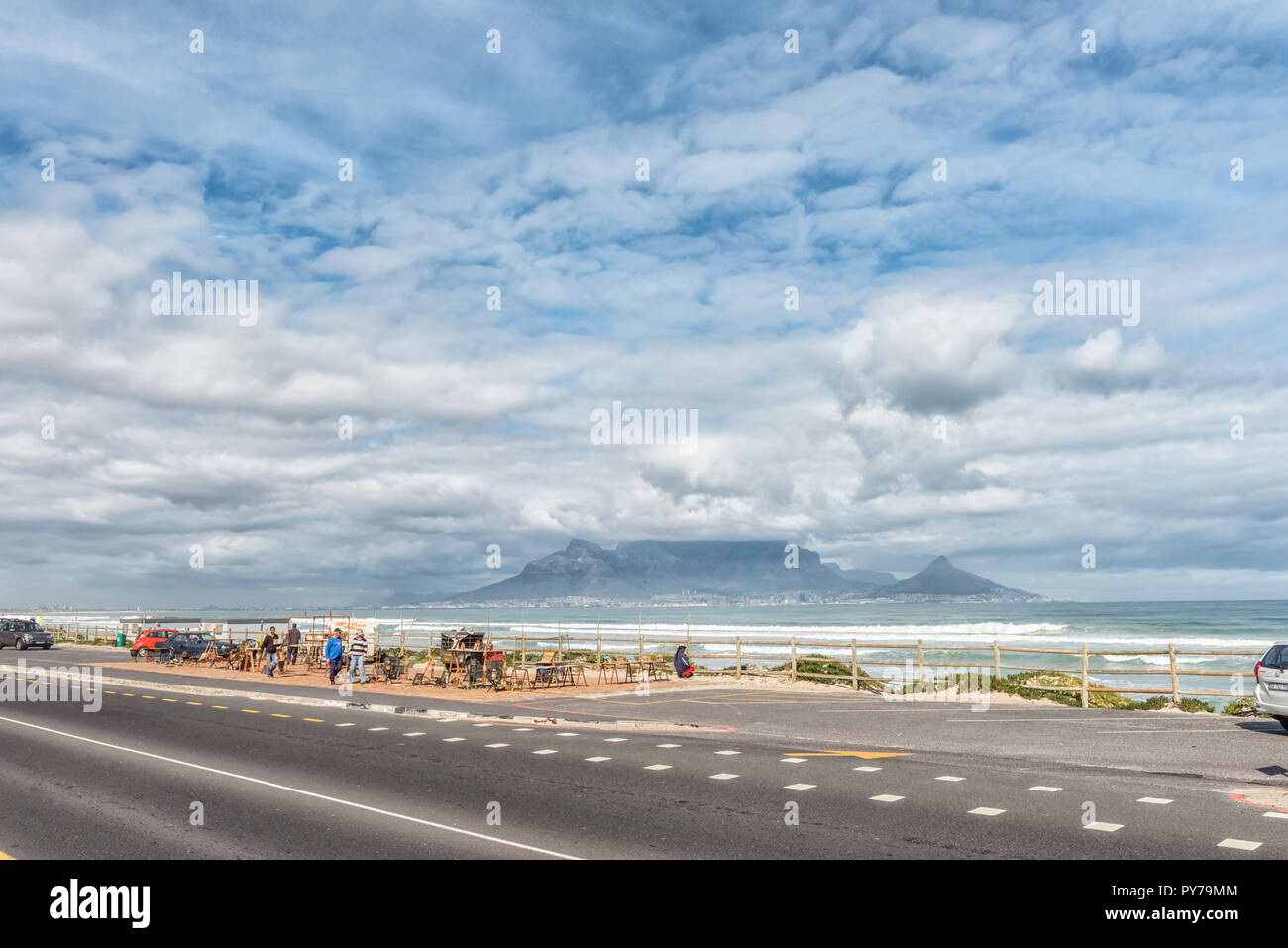 CAPE TOWN, SOUTH AFRICA, AUGUST 14, 2018: The Cape Town Central Business District and Table Mountain as seen across Table Bay from Bloubergstrand. An  Stock Photo