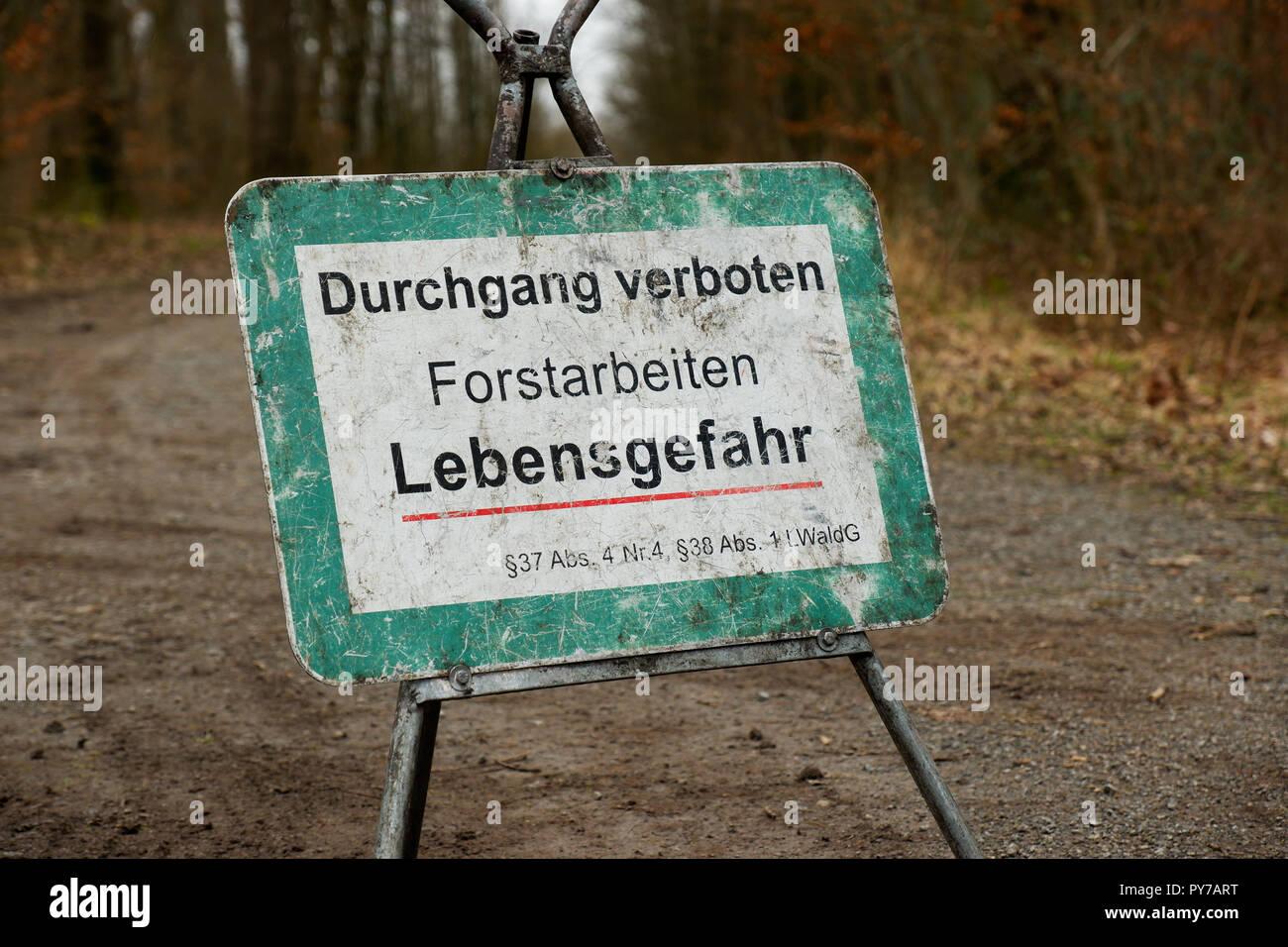 Warning Sign 'Forstarbeiten - Lebensgefahr' (German, 'Forestal Works - Risk of Death') Stock Photo