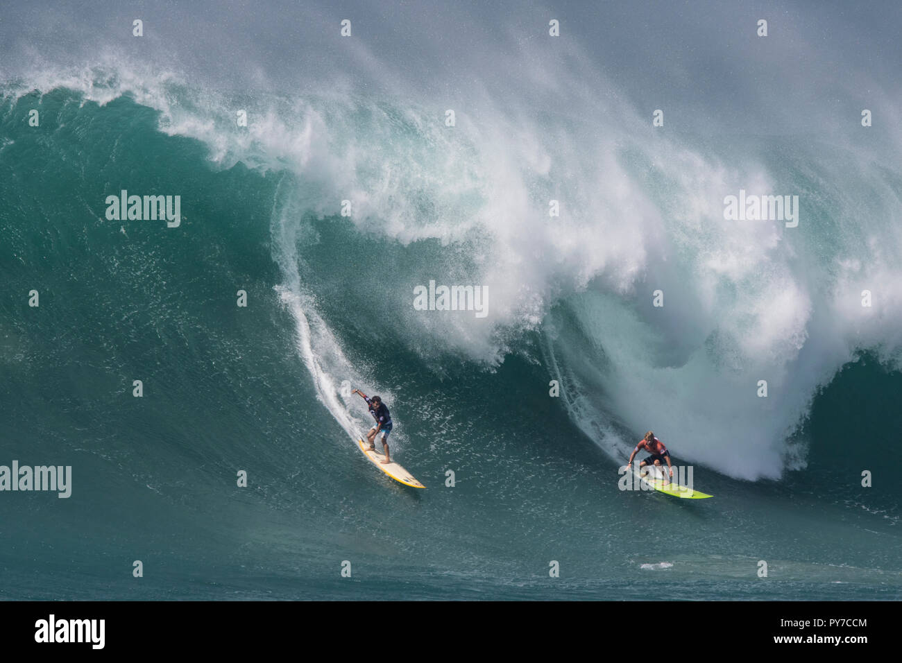 Mason Ho and John John Florence at the 2016 Eddie Aikau surf contest. Stock Photo