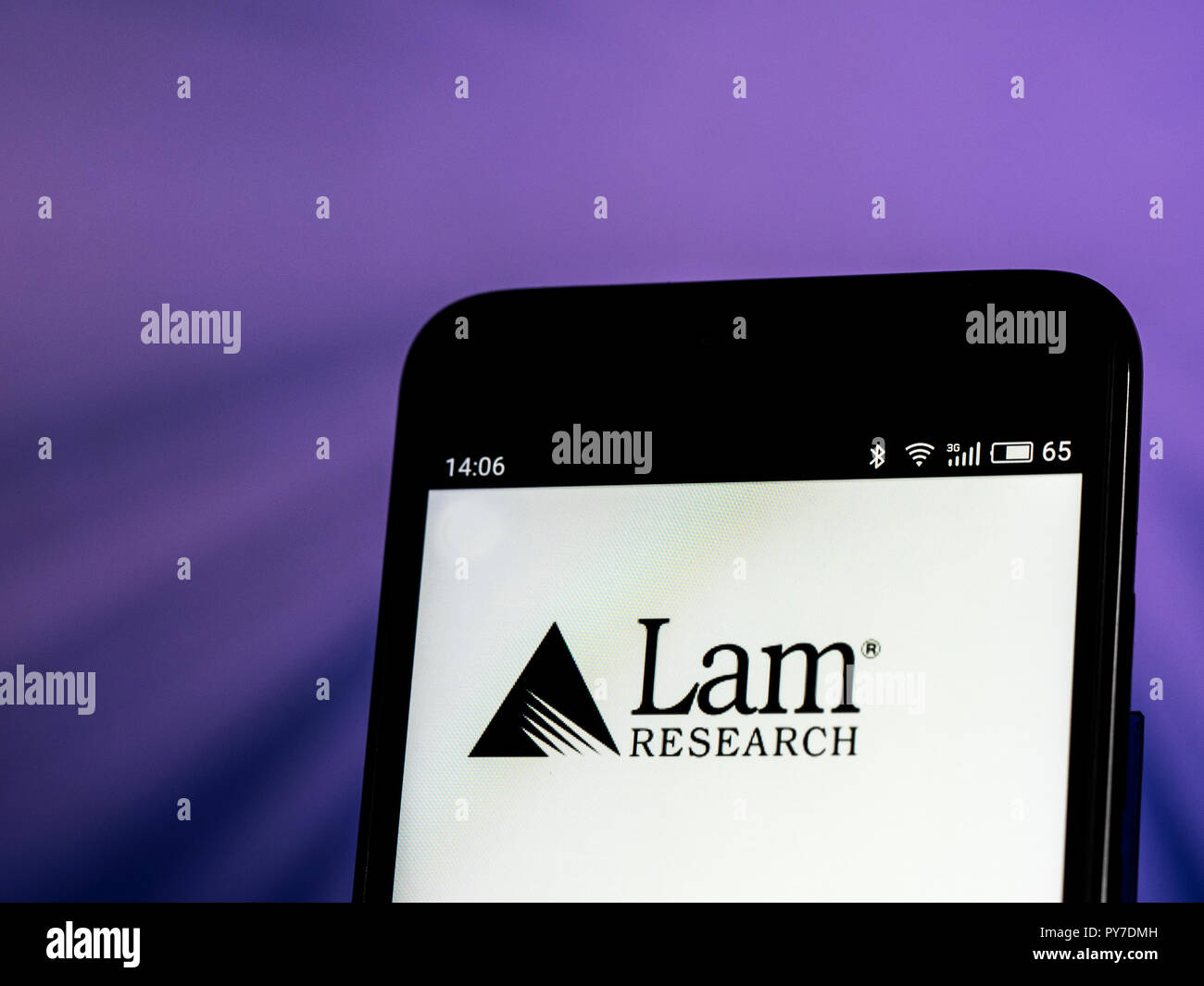 Lam Research Corporation logo seen displayed on smart phone. Lam Research Corporation is an American corporation that engages in the design, manufacture, marketing, and service of semiconductor processing equipment used in the fabrication of integrated circuits. Stock Photo