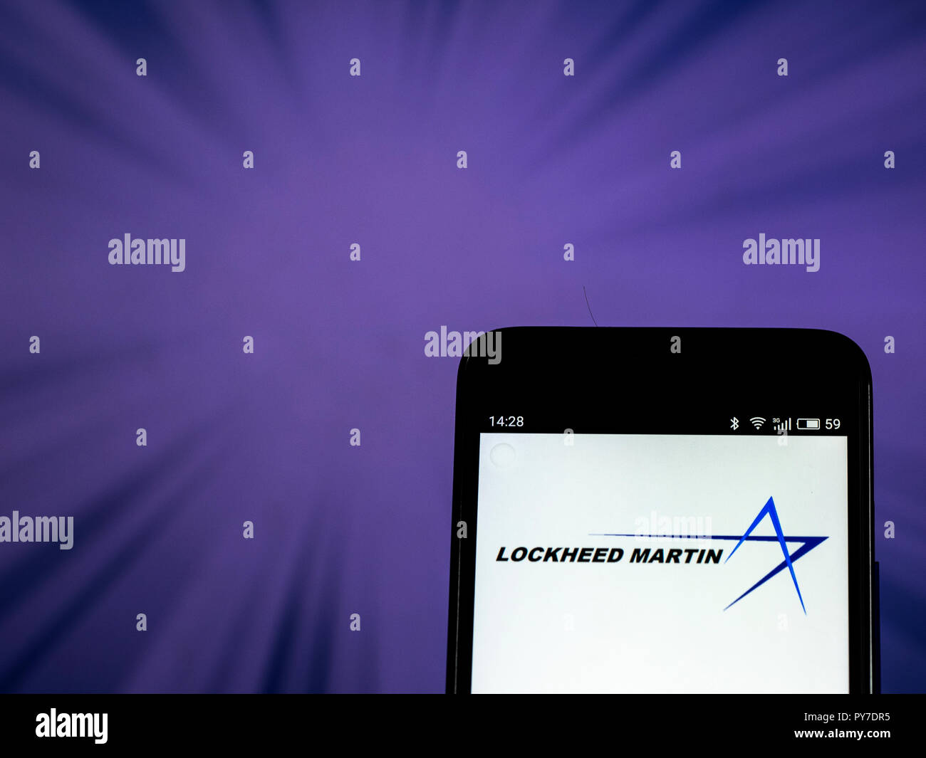 Lockheed Martin Aerospace and defense company logo seen displayed on smart phone. Lockheed Martin Corporation is an American global aerospace, defense, security and advanced technologies company with worldwide interests. Stock Photo