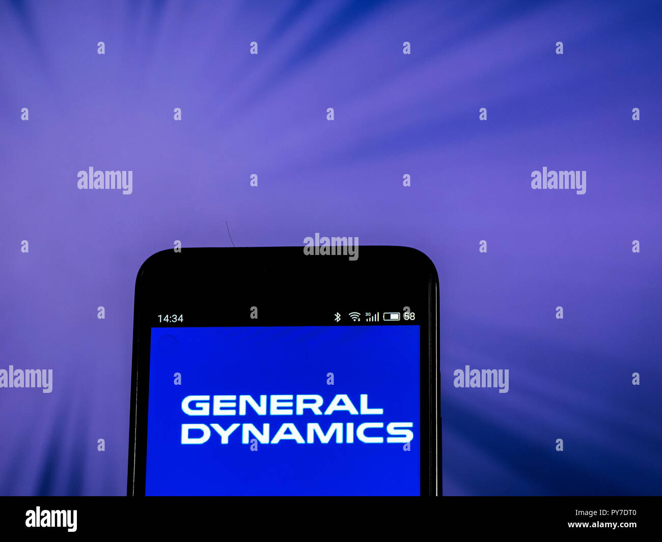 General Dynamics Aerospace and defense company logo seen displayed on smart phone. General Dynamics Corporation is an American corporation formed by mergers and divestitures. It is the world's fifth-largest defense contractor based on 2012 revenues. Stock Photo
