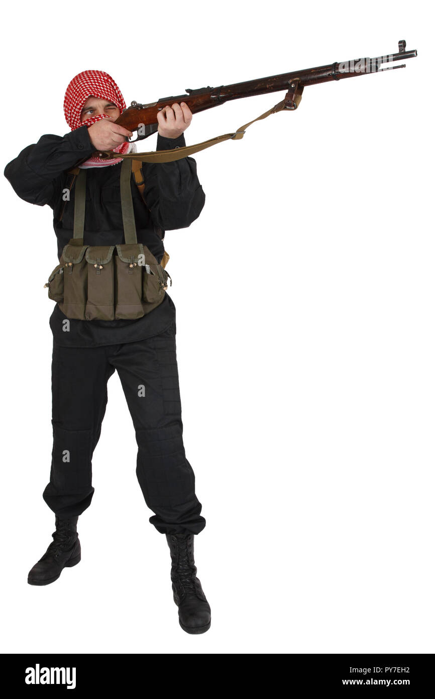 Rebel army soldier in black uniform with red kufiya holding old single shot, bolt action rifle. Isolated on white Stock Photo