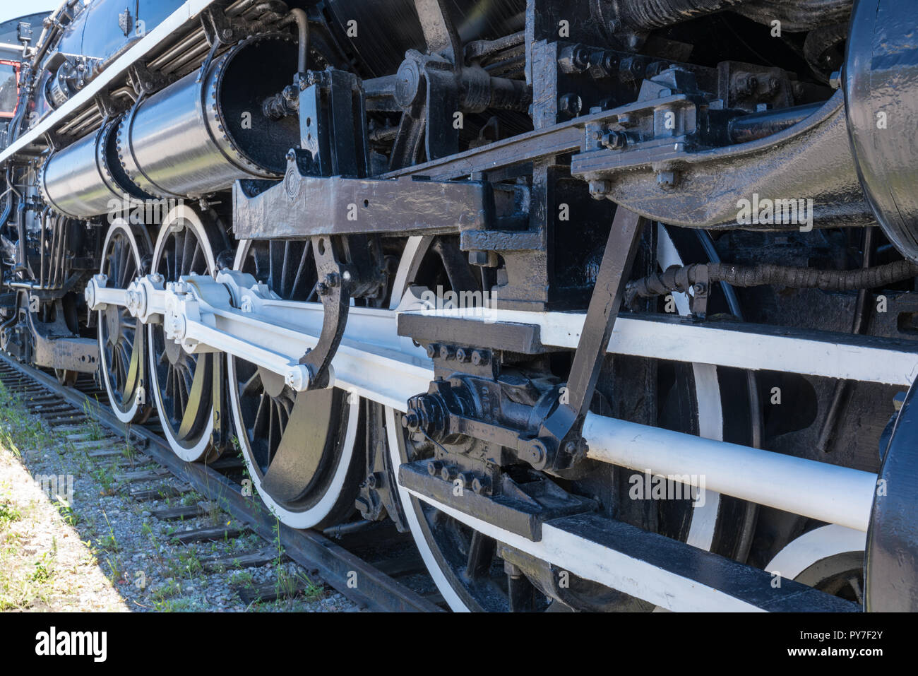 Iron Wheels of Old Steam Railroad Locomotive Stock Photo