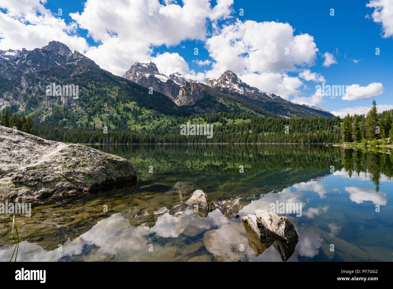 Reflection on Taggart Lake in Grand Teton National Park near Jackson, Wyoming Stock Photo