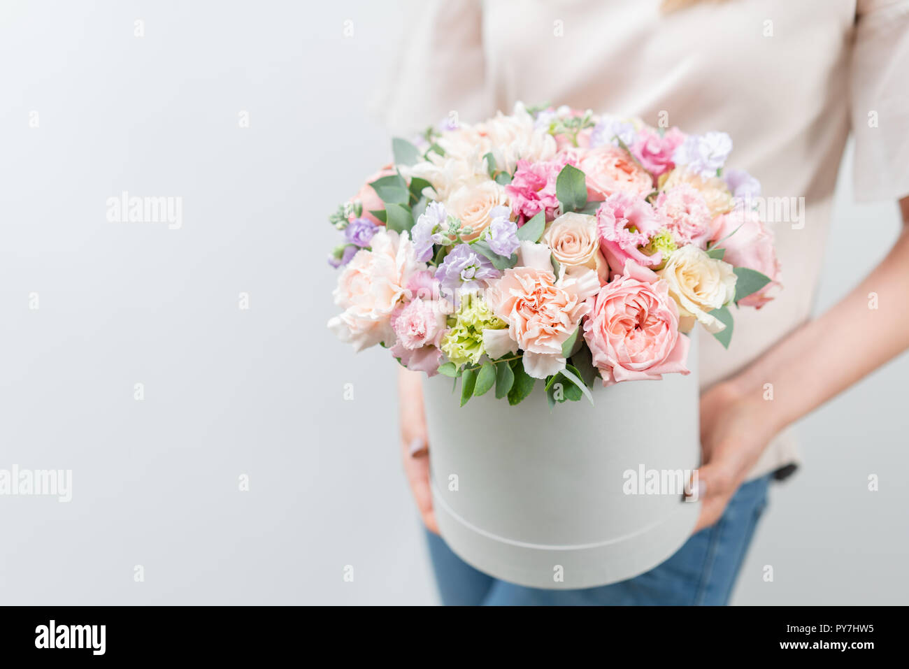 Beautiful Spring Bouquet In Round Box. Arrangement With Various Flowers.  The Concept Of A Flower Shop. A Set Of Photos For A Site Or Catalogue. Work  Florist Stock Photo - Alamy
