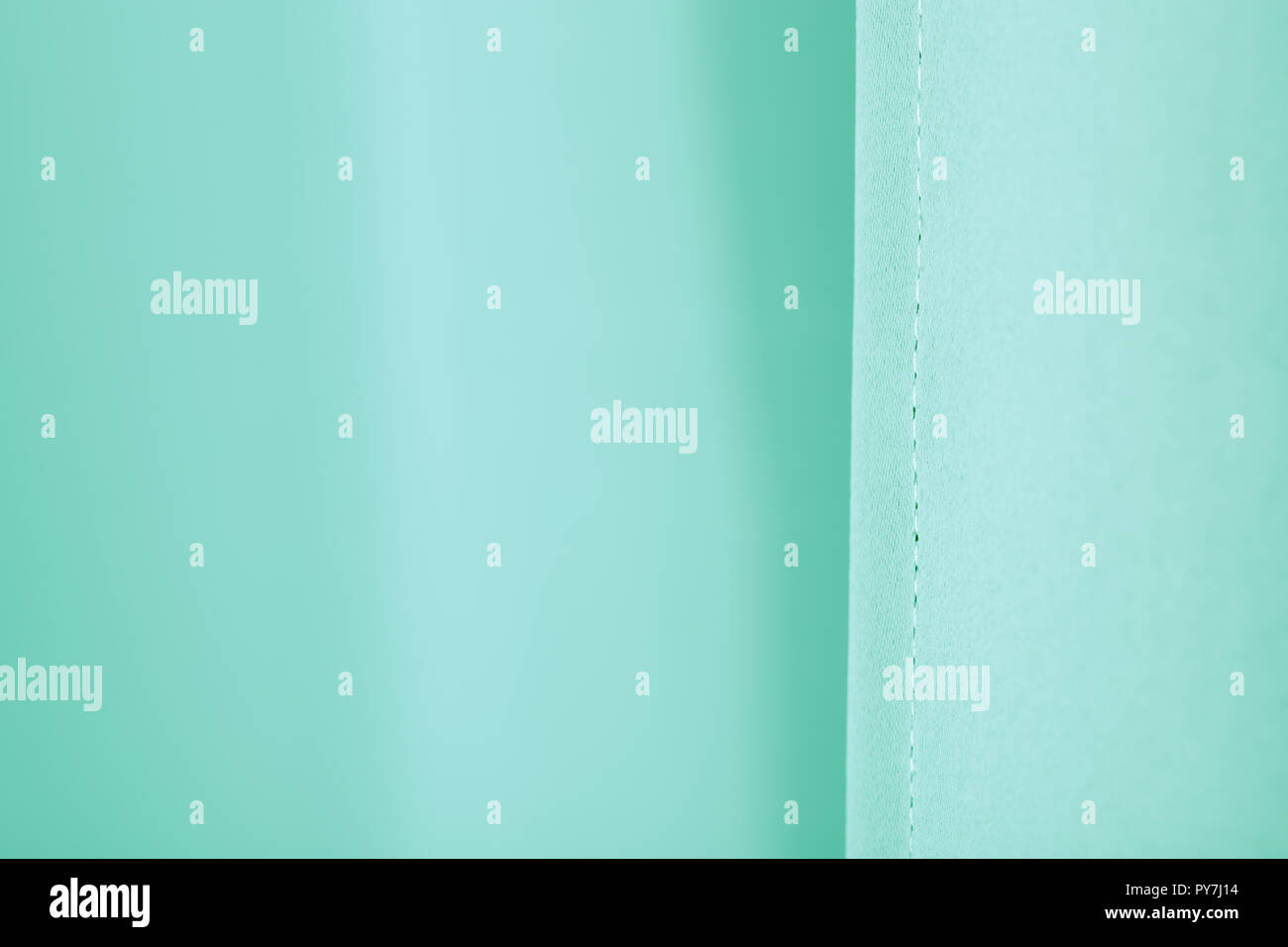 Blue and green fabric cloth background texture. Selected focus. Stock Photo