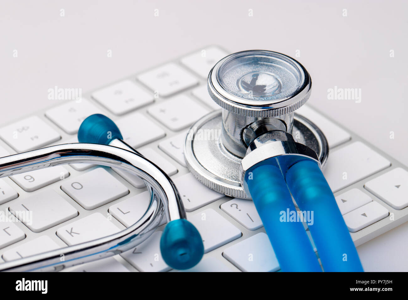 Keyboard and stethoscope and medical records Stock Photo - Alamy