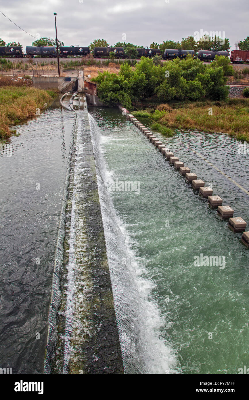 Tertiary-treated recycled water from the San Jose Creek Water Reclamation Plant is diverted to the unlined San Gabriel River for infiltration into the Stock Photo