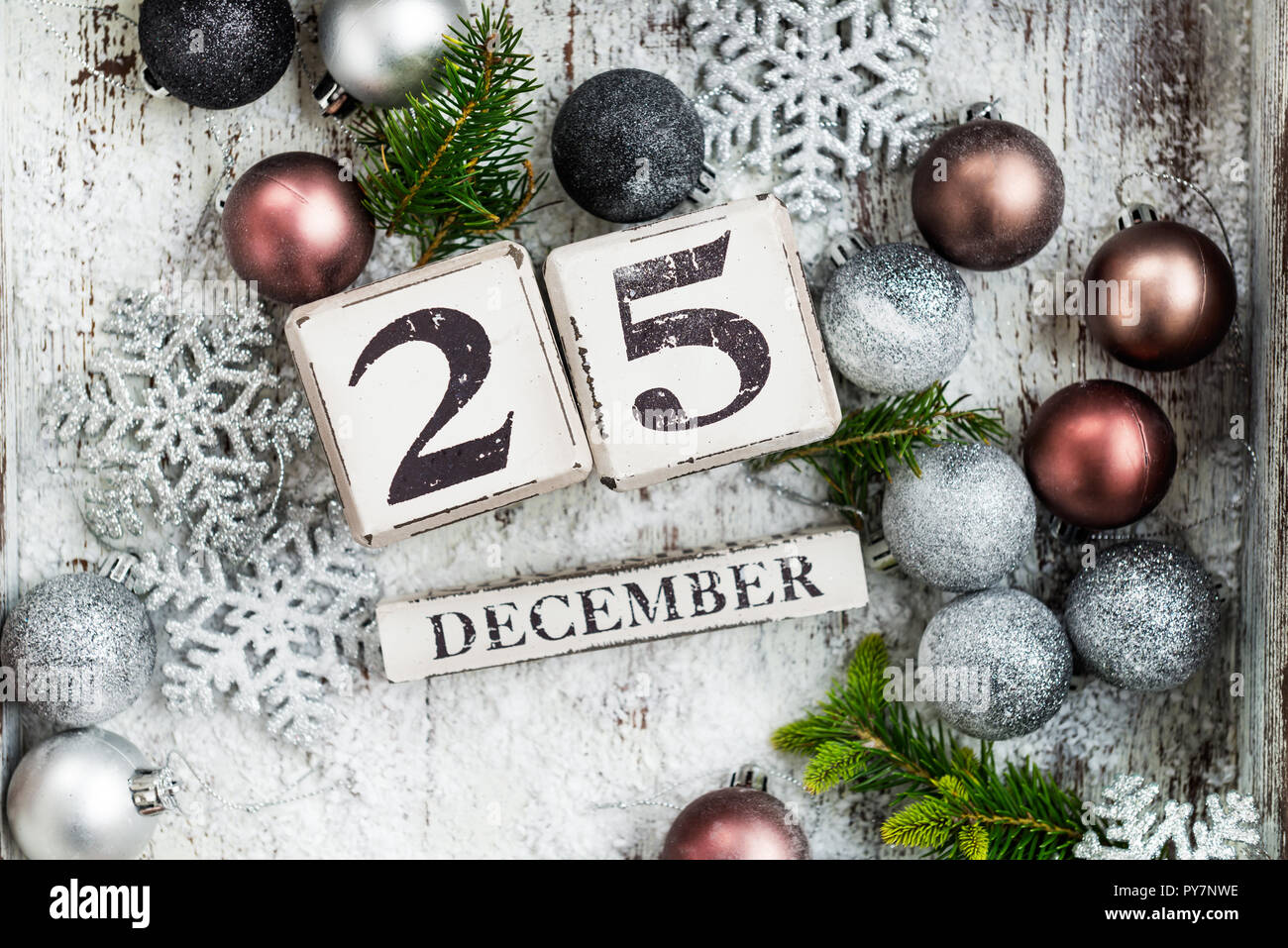 Christmas decorations and wooden blocks with 25 December date in wooden box.  Pastel Colors of bubbles, top view Stock Photo - Alamy
