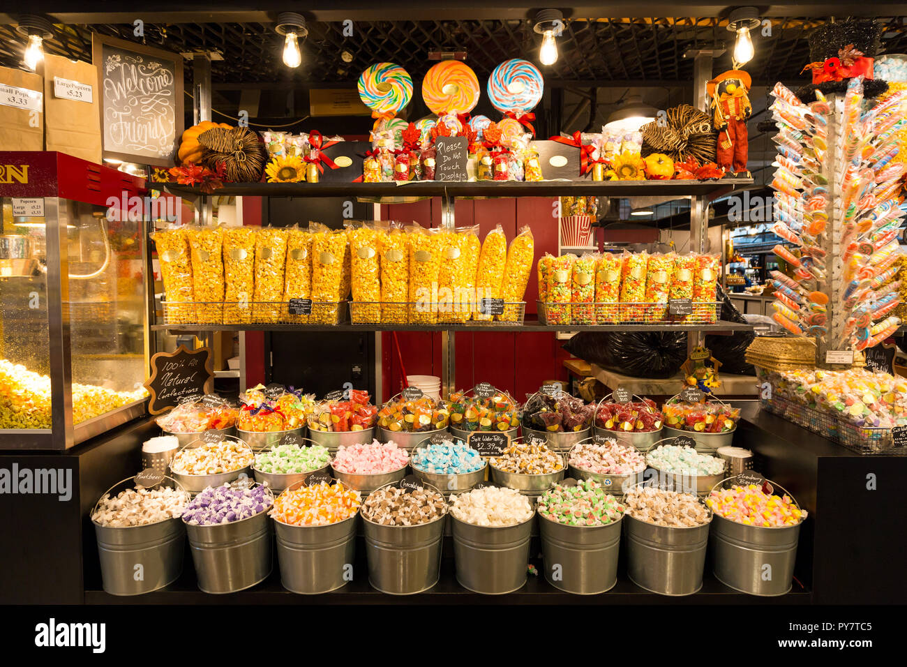 Buckets filled with taffy candy at a candy shop Stock Photo Alamy