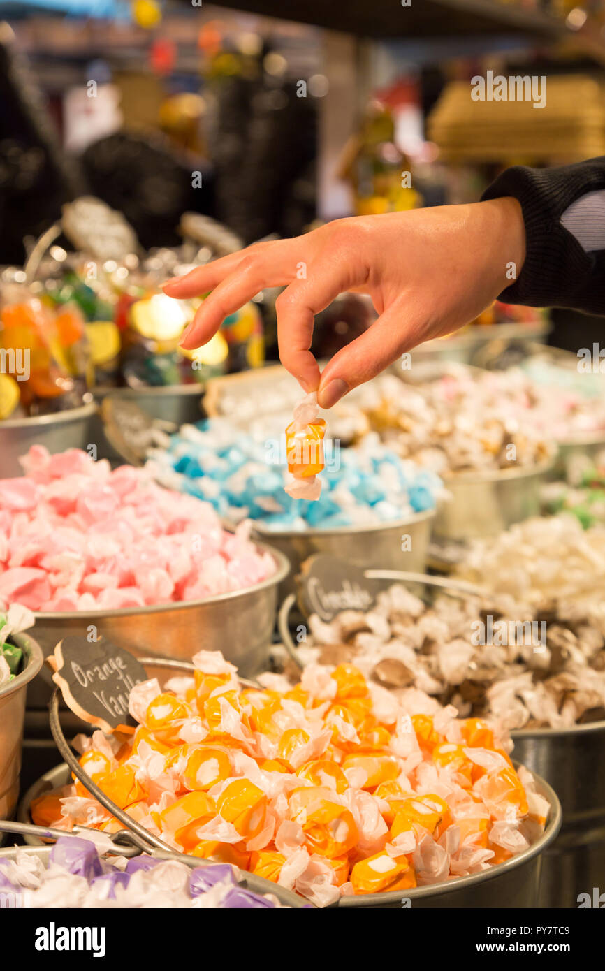 Buckets filled with taffy candy at a candy shop Stock Photo Alamy