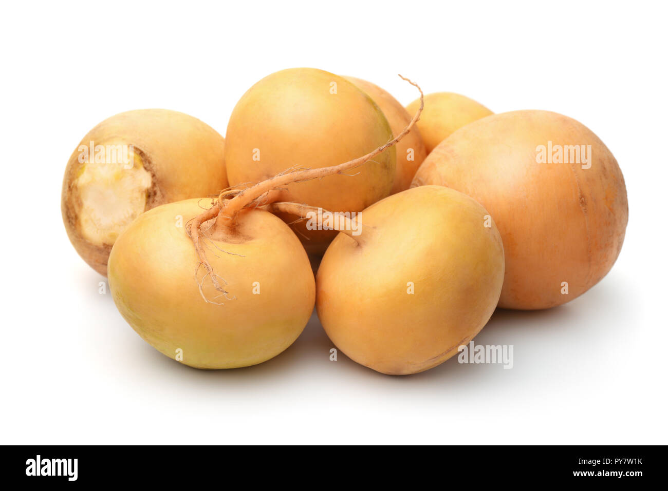 Group of fresh yellow turnips isolated on white Stock Photo