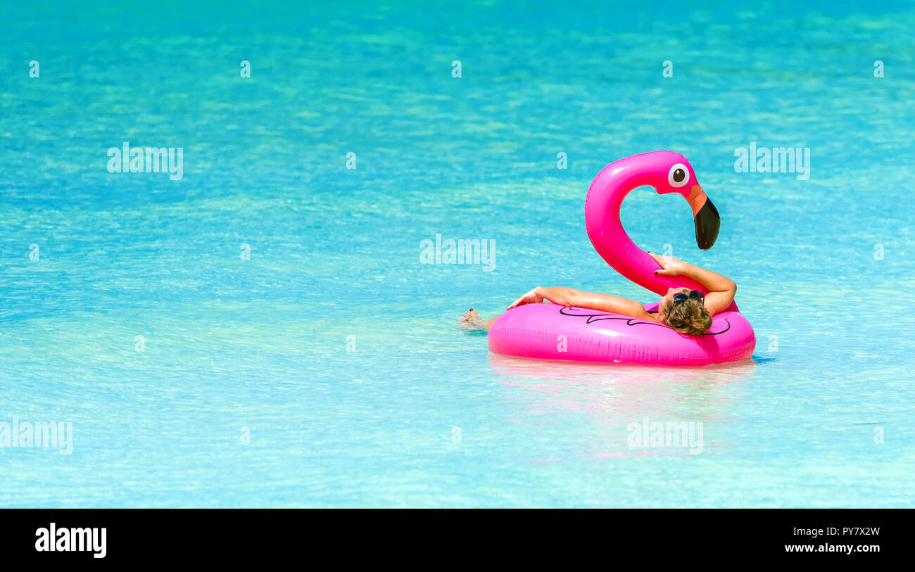 Inflatable circle in the shape of a pink flamingo, Boracay, Philippines ...