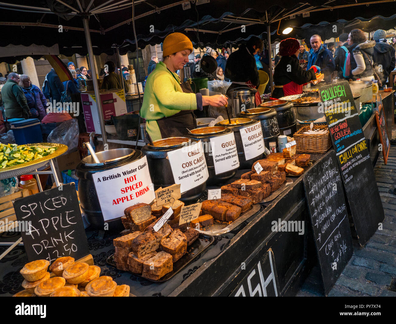 COVENT GARDEN WINTER FOOD Hot handmade alfresco takeaway food varieties stall Covent Garden winter street food piazza square market stall London UK Stock Photo