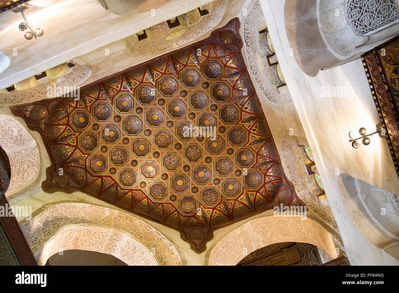 A ceiling in Qalawun Complex (Mosque, and others) in Al-Moez Street, Cairo, Egypt. engraving units. Beautiful historical architecture since 1285 A.D. Stock Photo