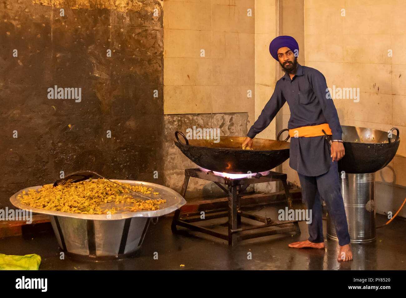 Cooking Food at Langar Hall Community Kitchen,. Amritsar, Punjab, India Stock Photo