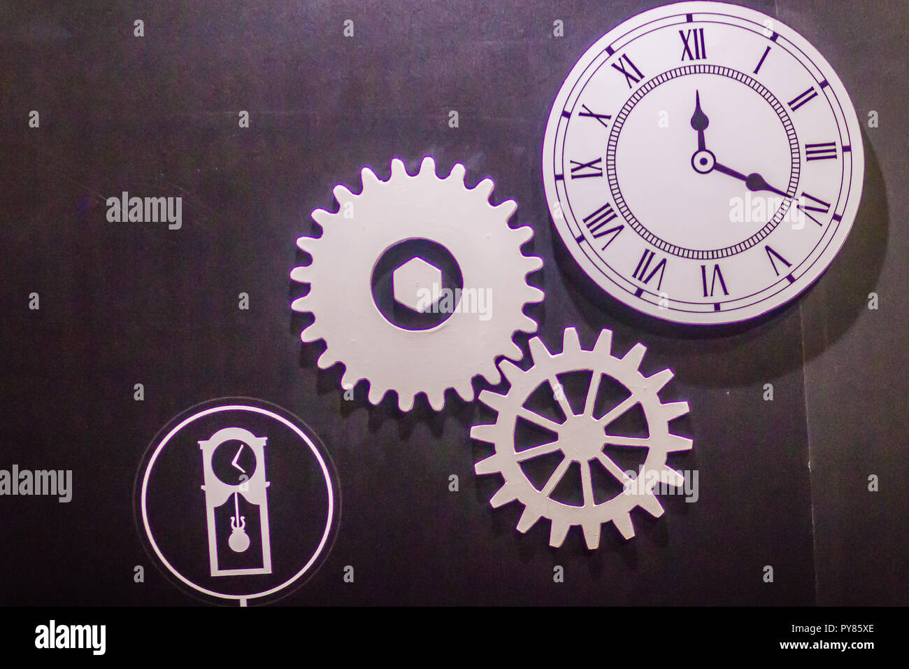 Clock and gears concept. Clock gears are used to allow the clock to run