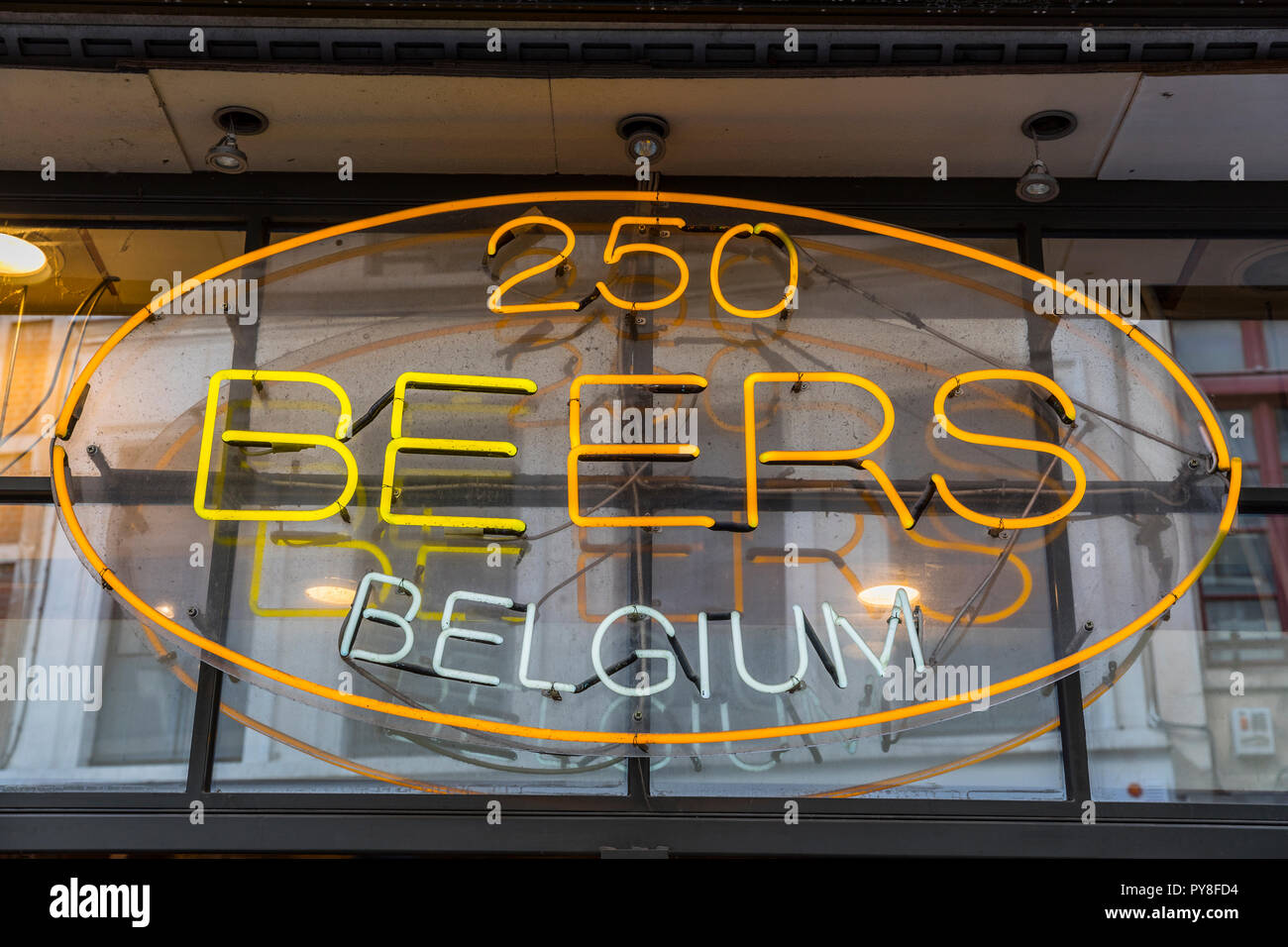 Neon glow sign of beer shop in Brussels Stock Photo