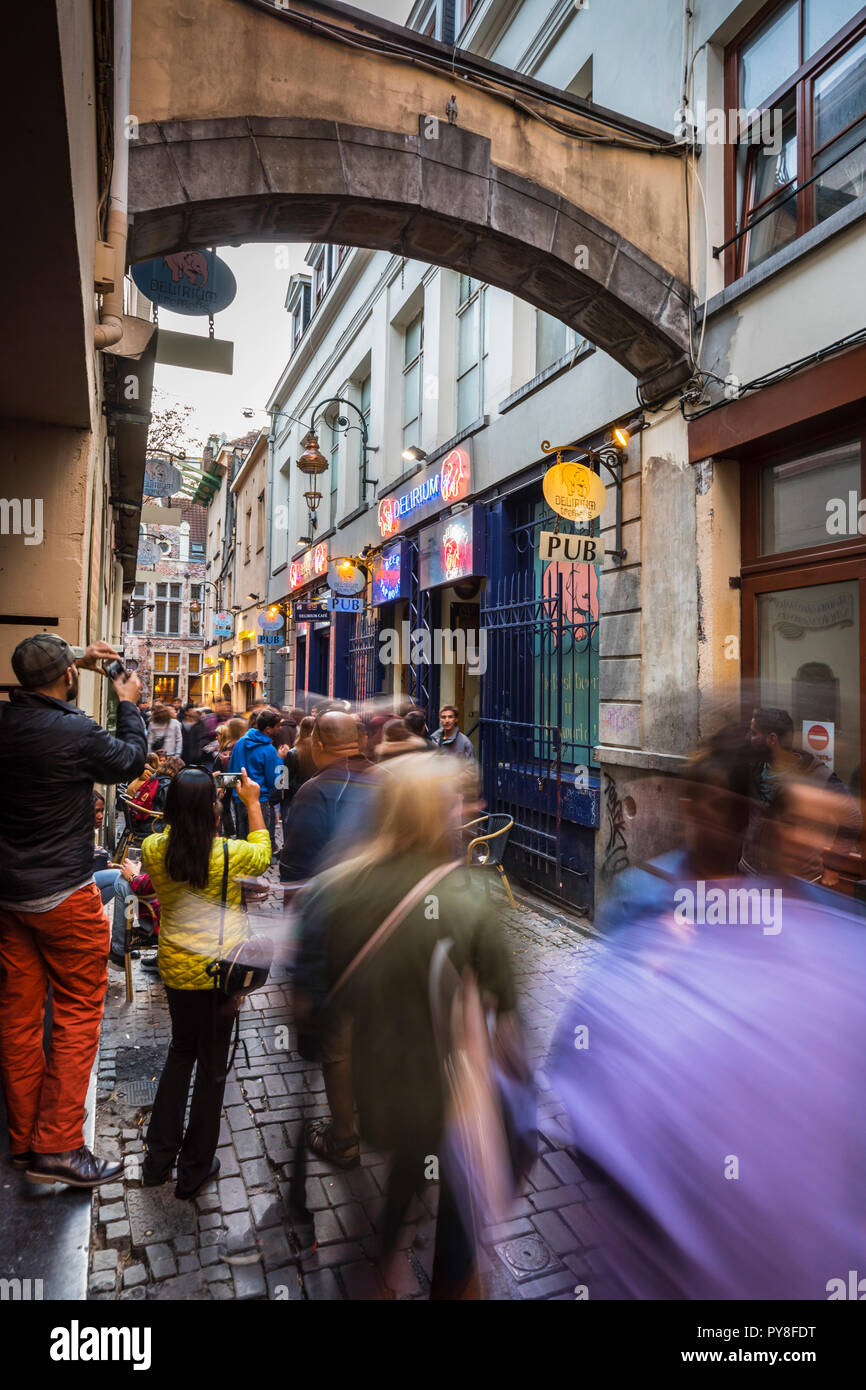 Tourists walking in front of popular Delirium beer bar in Brussels Stock Photo