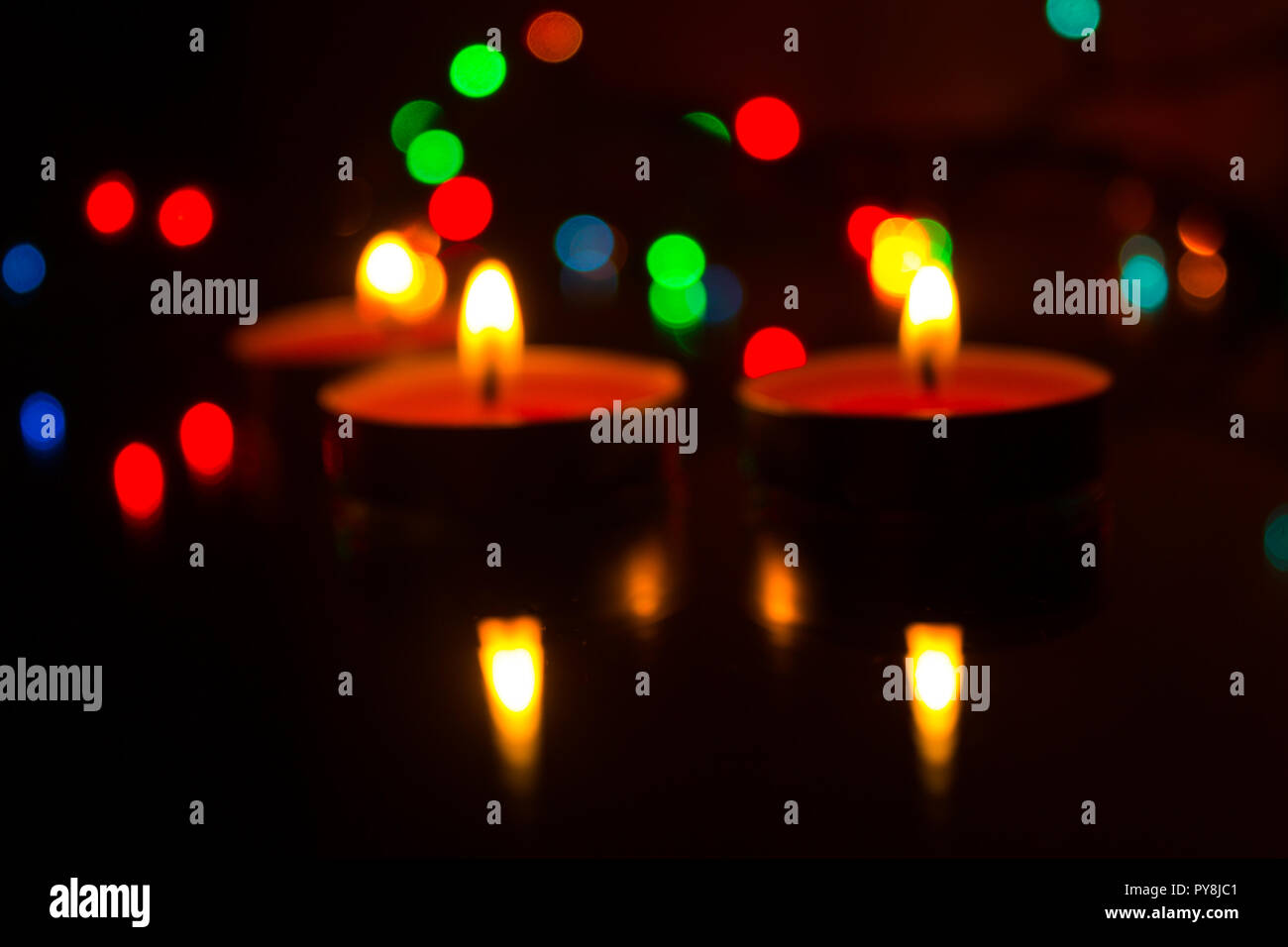 Wax candles burn in dark light. Wax candle. Burning fire Light from the fire Stock Photo Alamy