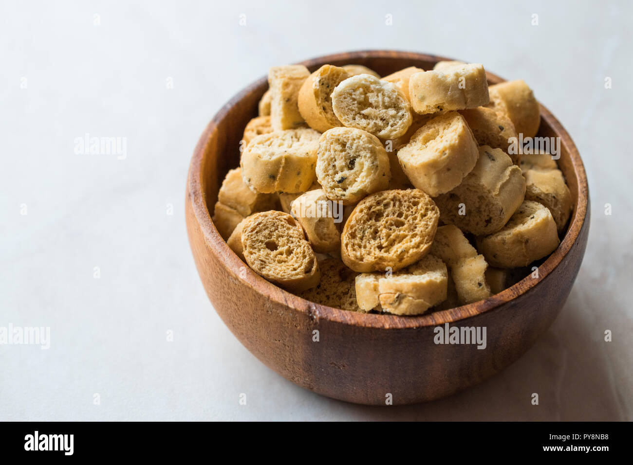 Stack of Round Shaped Crispy Rye Crouton Bread Biscuits / Crostini. Organic Appetizer Chips. Stock Photo