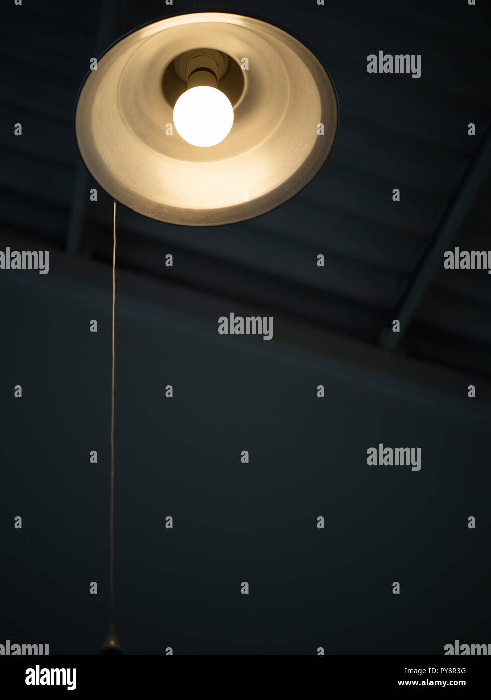 Lighting From Vintage Round Ceiling Lamp With Pull Cord
