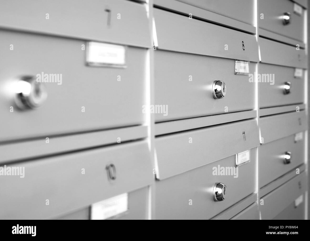 Aluminum mail boxes. Ideal for concepts such as safety and security, business communication and more. Shallow DOF. Stock Photo