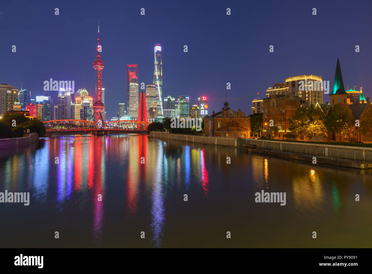 Pudong Skyline during the blue hour with golden week lighting Stock Photo