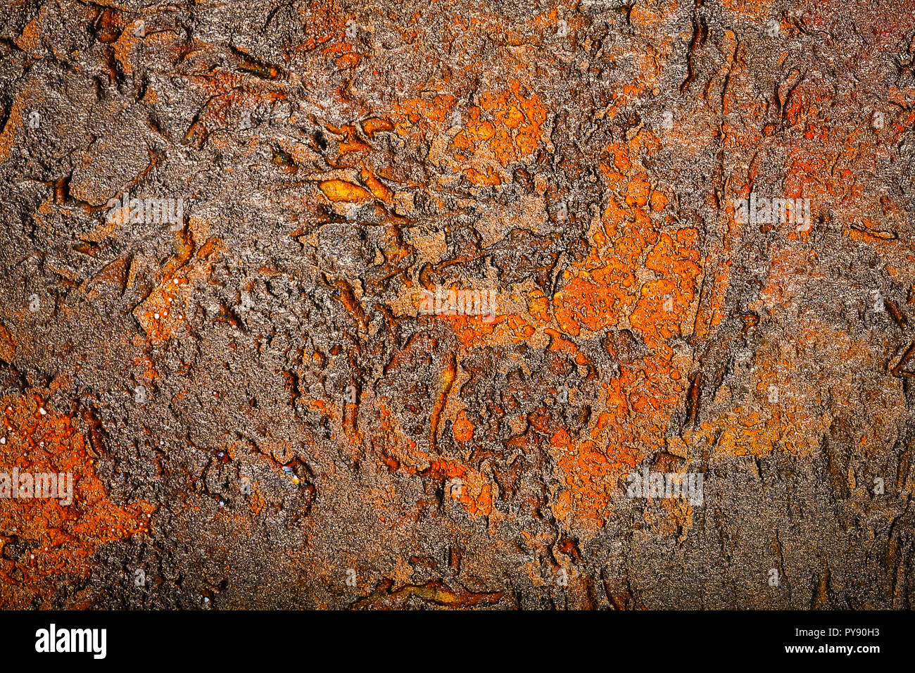 Black with brown bumpy wall stucco texture background. Decorative wall