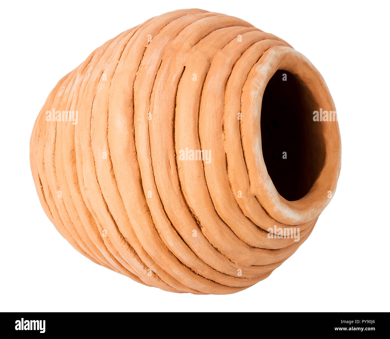 Unglazed handmade coiled pottery pot made of red clay isolated on white