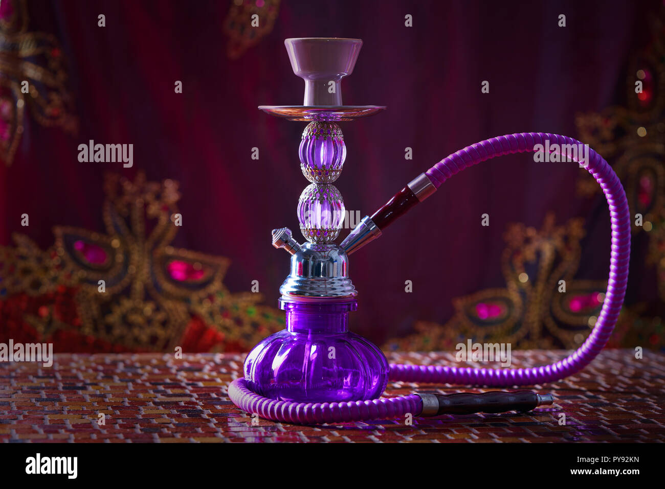 hookah shisha smoke purple glass pipe Stock Photo