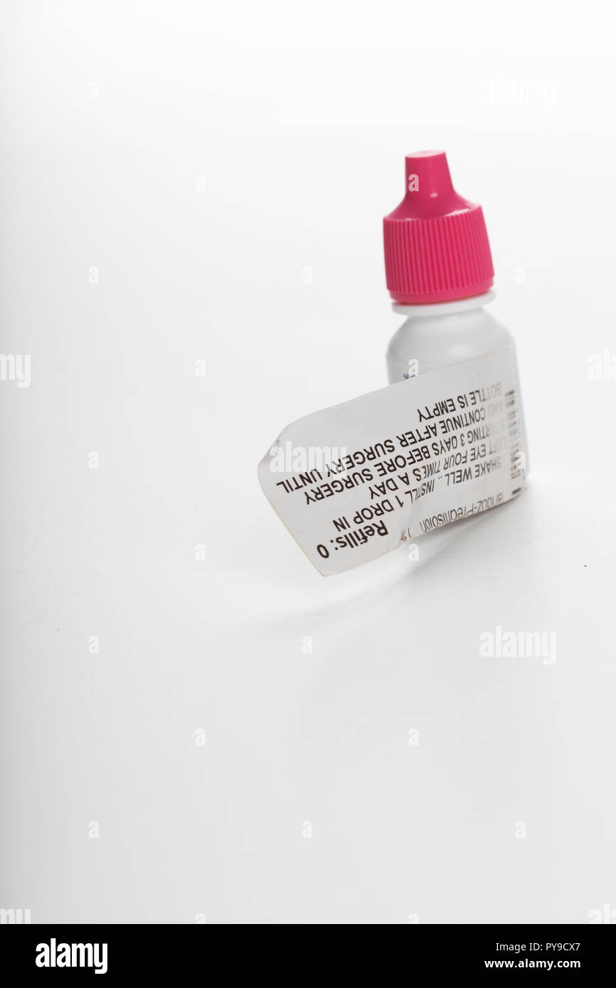 Pink cap eye drop bottle, antibiotic prescription medicine Stock Photo