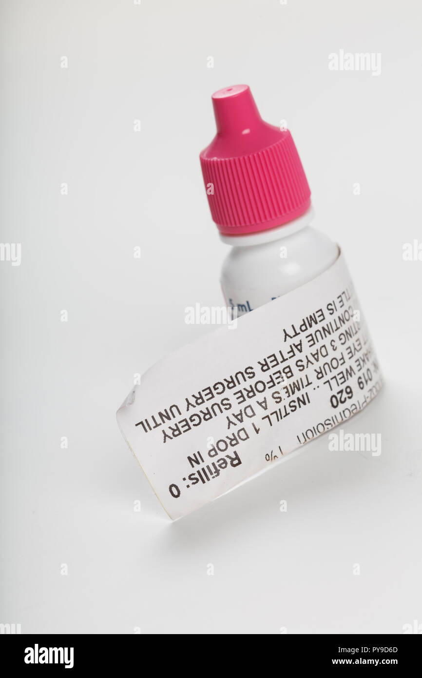 Pink cap eye drop bottle, antibiotic prescription medicine Stock Photo
