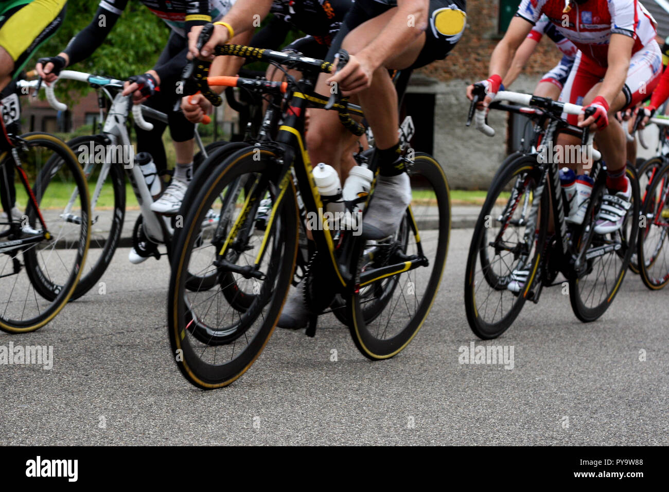 A group of cyclists racing at the Belgian Championship in Geel, Belgium 2012. Motion Blur. Stock Photo
