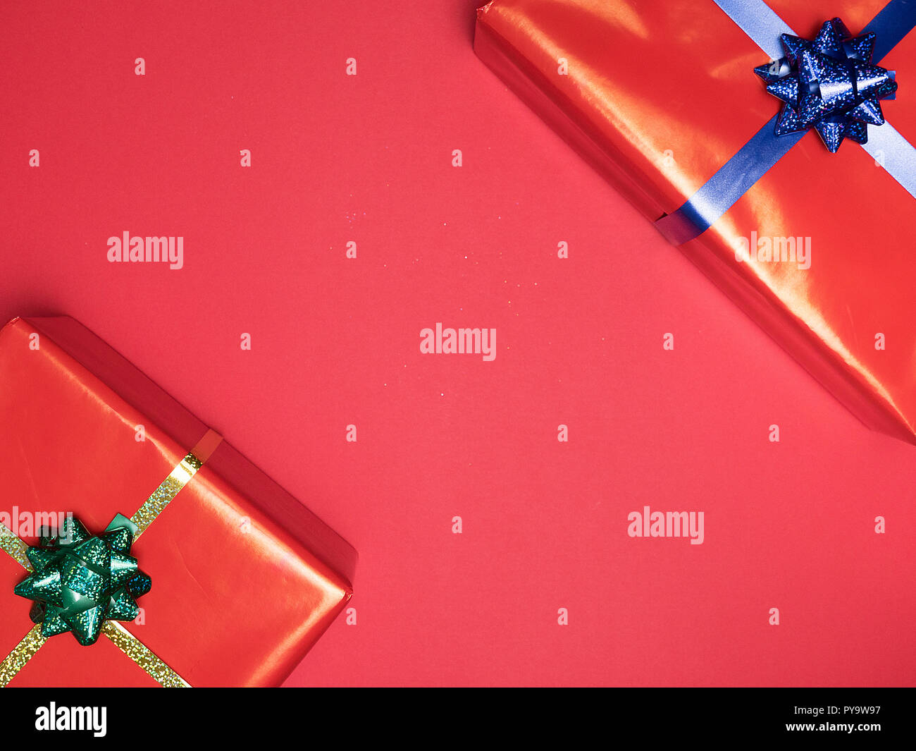 Beautiful Christmas red gif boxe on red background. Elegance style Stock Photo