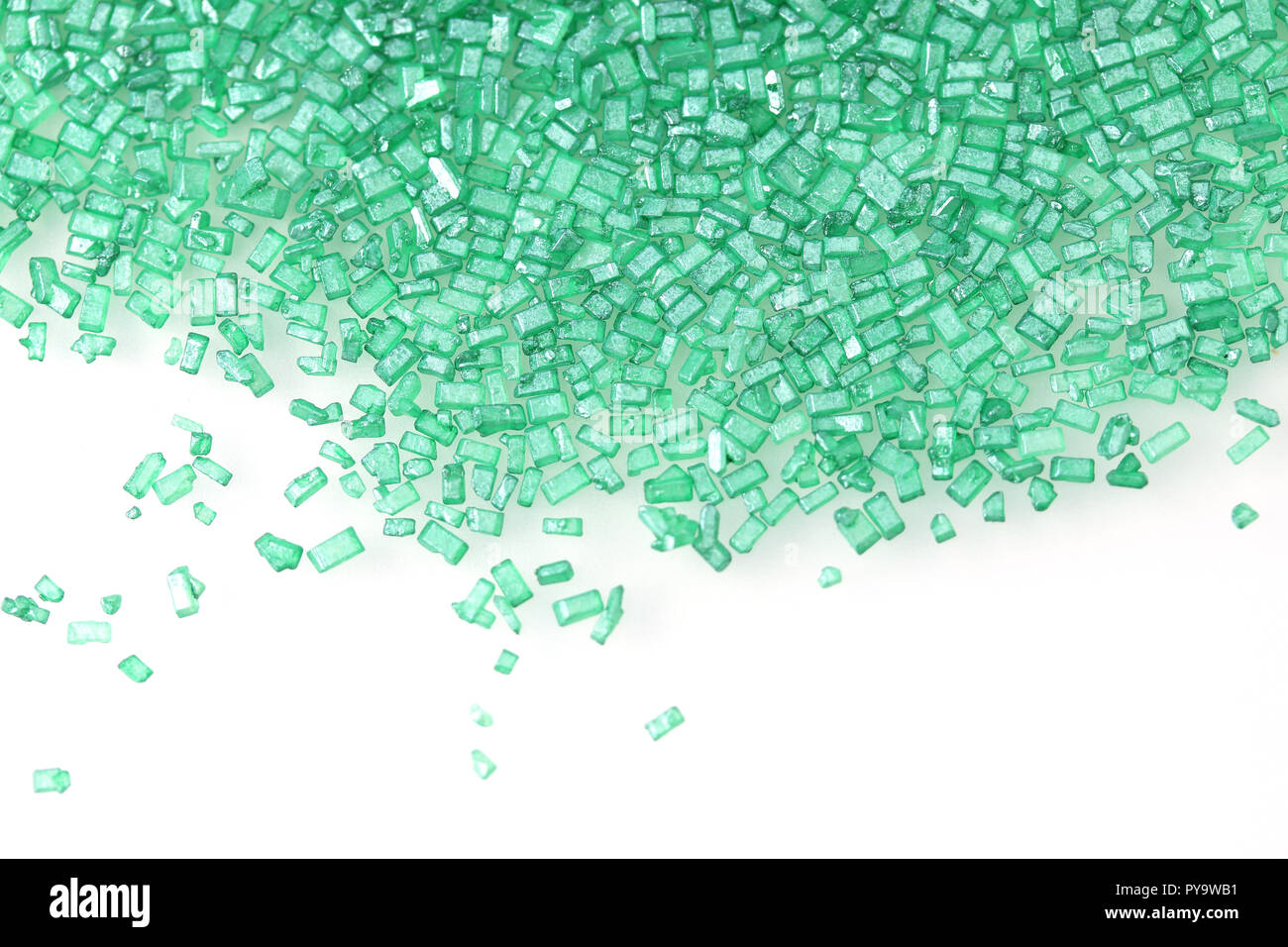 Green sugar isolated on white as an abstact mosaic Stock Photo