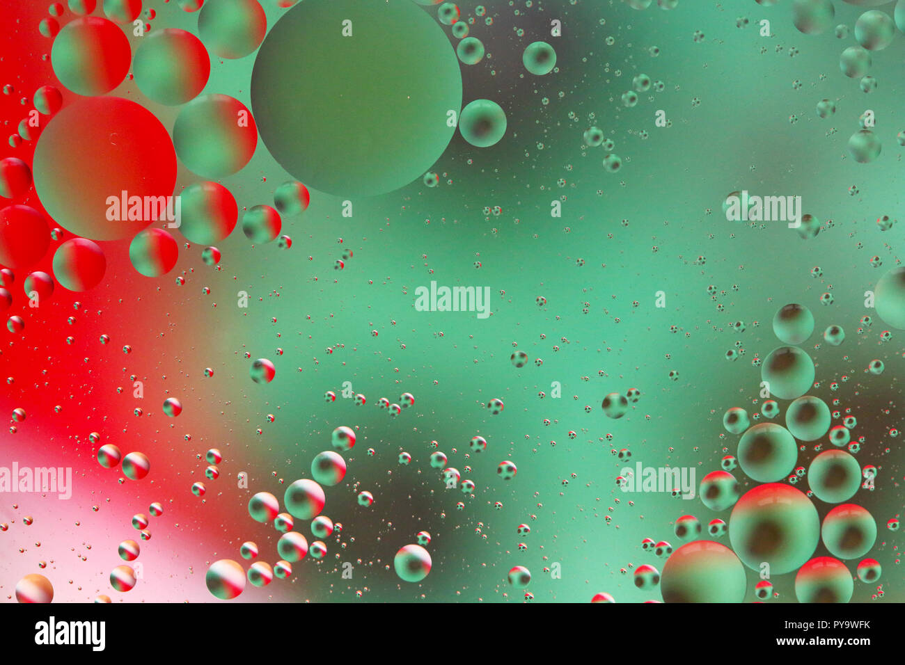 Abstract red and green bubbles - oil on water Stock Photo